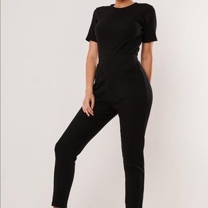 black jersey rib pocket front jumpsuit